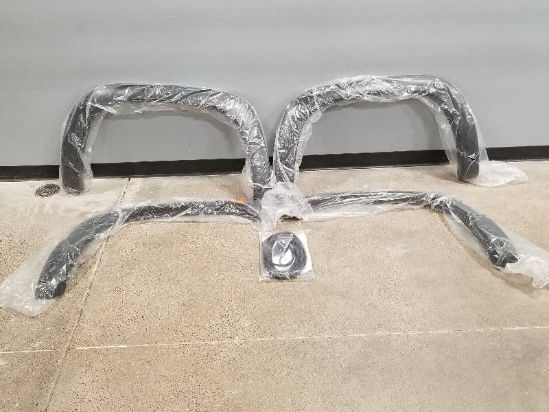 lot 14 image: Lund Elite Series 1999 to 2007 Chevrolet Silverado 1500 Black Rivet Style Textured Front and Rear Fender Flare (4-Piece)