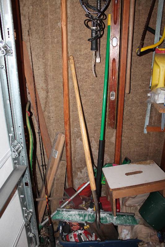 lot 209 image: Yard Tools - Rake, Broom, Level, Racket, Tree Saw, Fishing Pole, And More