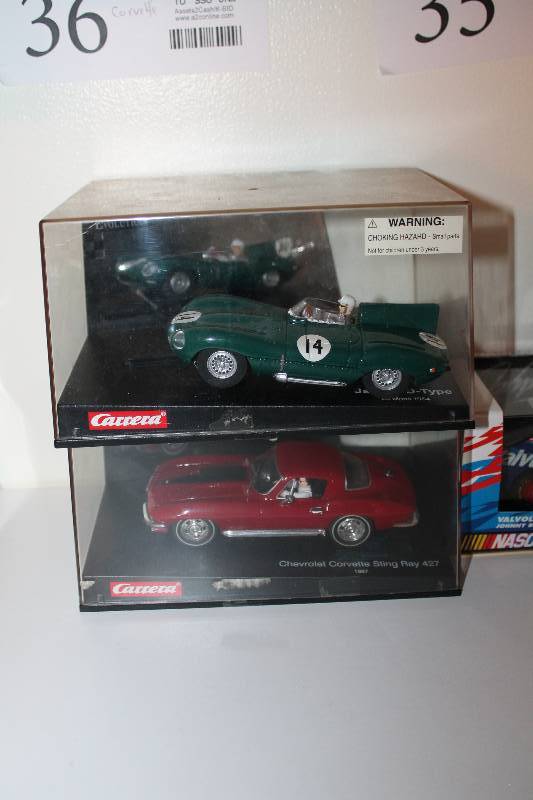 lot 36 image: Lot of (2) Carrera Evolution Slot Cars - Jaguar D-Type, 1967 Corvette Sting Ray 427