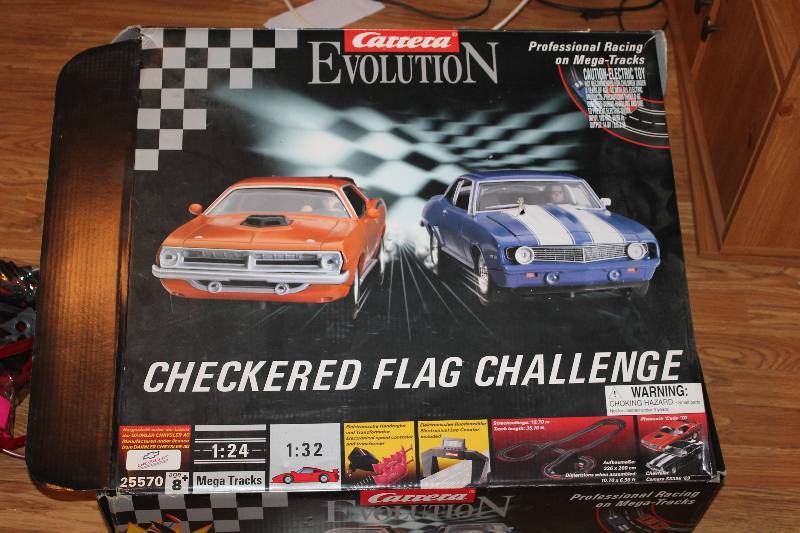 Carrera Evolution Checkered Flag Challenge Slot Car Track Set | Coon Rapids  Estate Moving Sale | K-BID