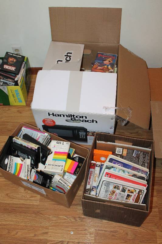 lot 54 image: Lot of (3) Boxes of VHS Tapes, Books