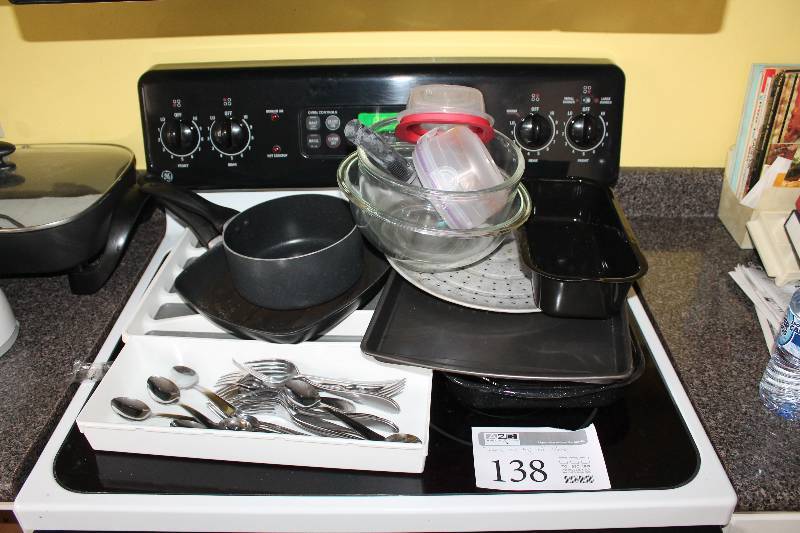 lot 138 image: Utensils, Pots, Pans, Glass Bowls, Tupperware, Utensil Trays, And More