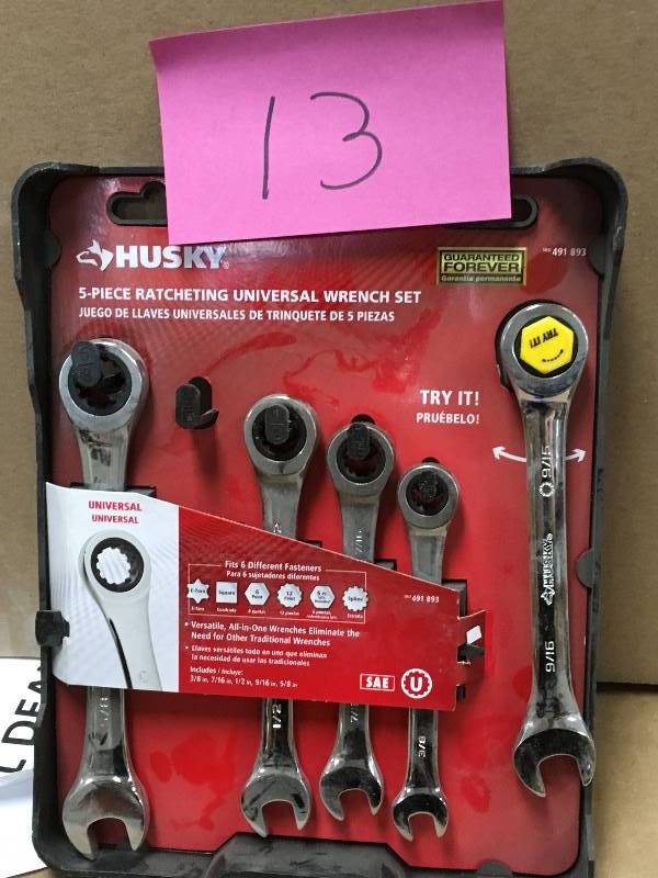 lot 13 image: Husky 5-Piece Ratcheting Universal Wrench Set
