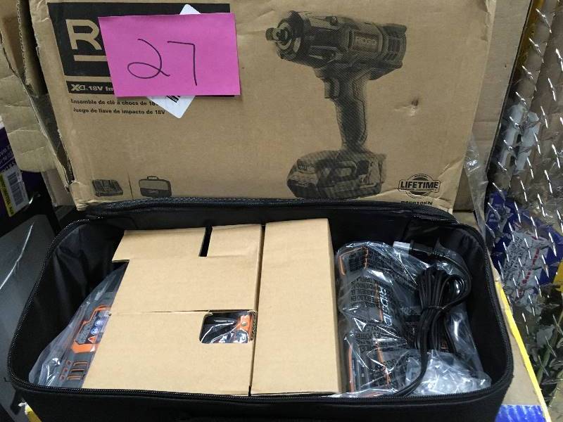 lot 27 image: Ridgid 18 Volt 12 in. Impact Wrench Kit