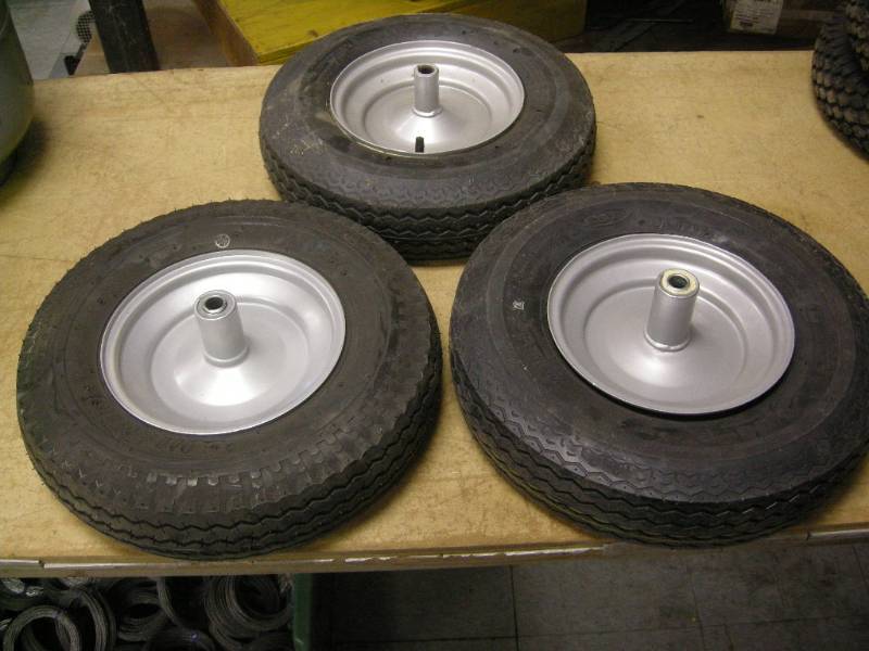 lot 142 image: 3 4.80-8 tires on Rims