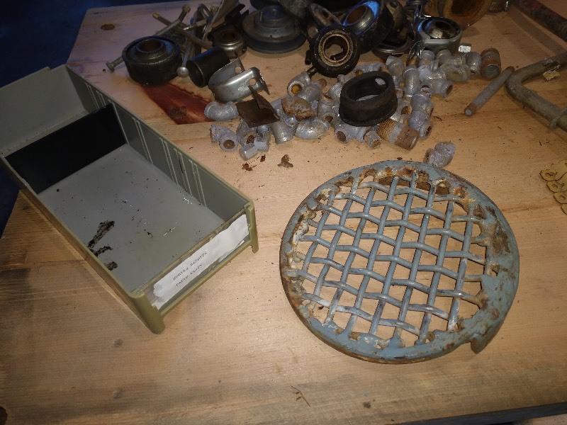 lot 67 image: Salvaged Items- Steel Card File Drawers (2), Bearings, Grate, Wiremold Legrand 504 Mounting Strap Buff (10) and Parts