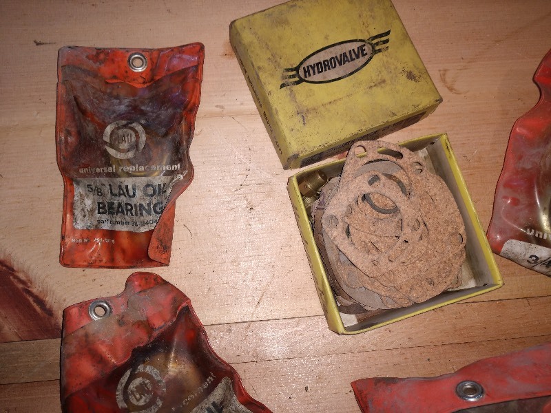 lot 70 image: LAU Industries Universal Replacement Bearings and Yellow Box Hydrovalve Strainer Cover GS-130