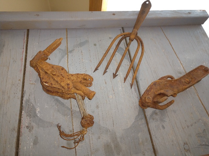 lot 73 image: Cast Iron Hay Pulley, Antique Cast Iron Pitch Fork, Cast Iron Hook