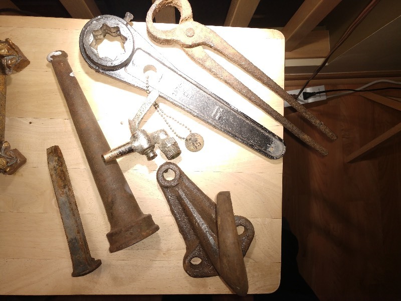 lot 136 image: Blacksmith Forged Handtool, Surge Milker Spout, Antique Fire Nozzel, Railroad Spike, Hook