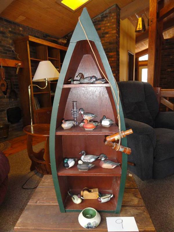 lot 9 image: Decorative Wood Canoe Shelf with Figurines and Table