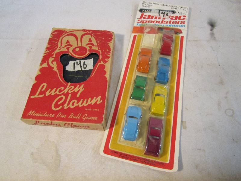 lot 19 image: Vintage, Lucky Clown, Miniature Pin Ball Game. Vintage, Tootsie toy Jam Pac Speedsters, Dated 1983