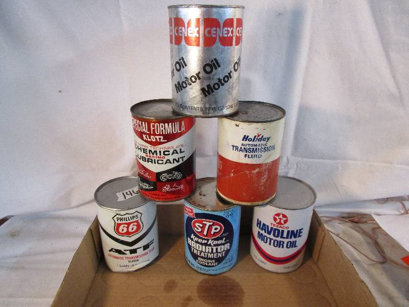 lot 20 image: Six 1 qt. cans, 5 full, 1 mt. Cenex, Texaco, Holiday, Phillips 66, Klotz, Stp Radiator treatment.