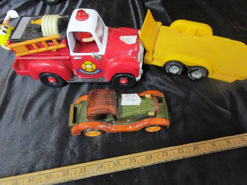 lot 35 image: Wood Truck Plastic Nylint Trailer and M&M Fire Truck