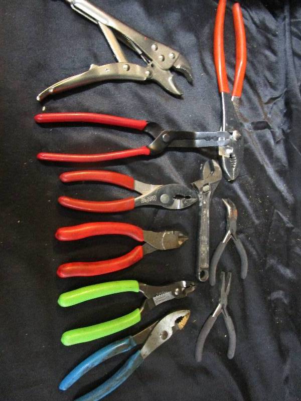 lot 104 image: Pliers, wire stripper, crescent wrench, vise grip