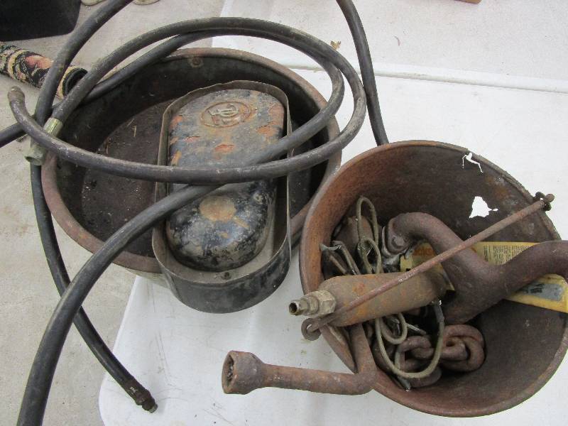 Rusty Pail, Oil Cathers and Hydraulic Hoses and Assorted Items