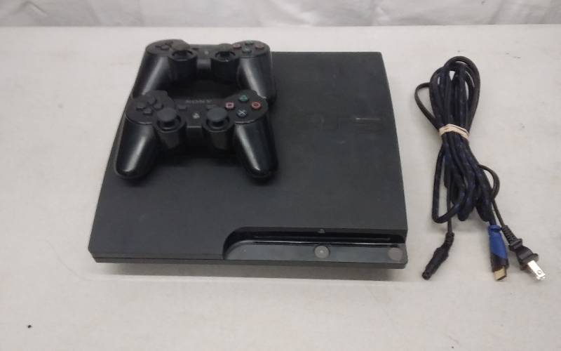 Sony PS3 Gaming Console With Power & AV Cords, 2 Wireless Remotes