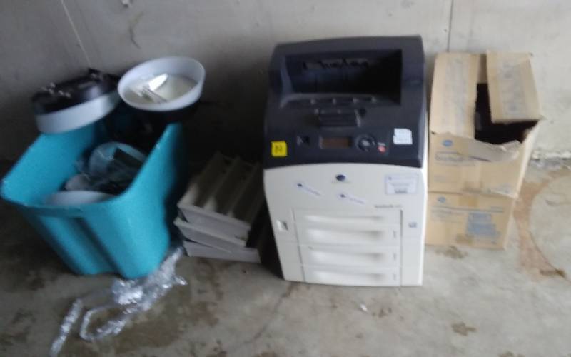 lot 4 image: Konica Minolta Biz Hub 40P Printer With 2 Extra Cartridges, Tub Of Magnetic Fluorescent Light Fixtures & Misc