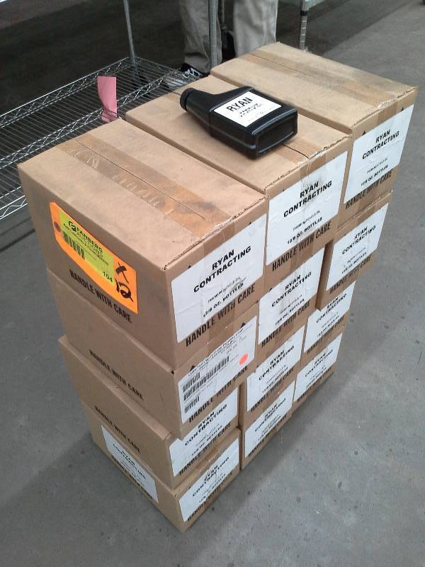 lot 104 image: Twelve Cases of Ryan Contracting Premium 2-Cycle Oil