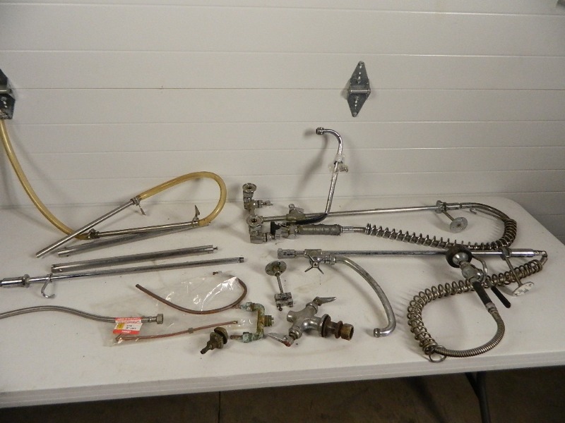 lot 93 image: Assorted Sink Sprayers, Faucets, Etc