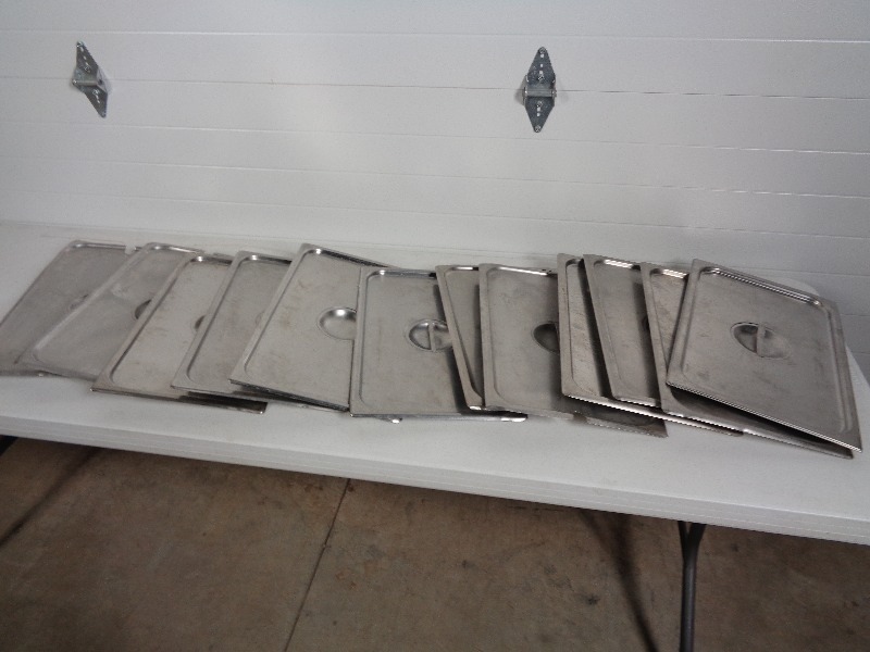 lot 70C image: 12 Stainless Steel Lids