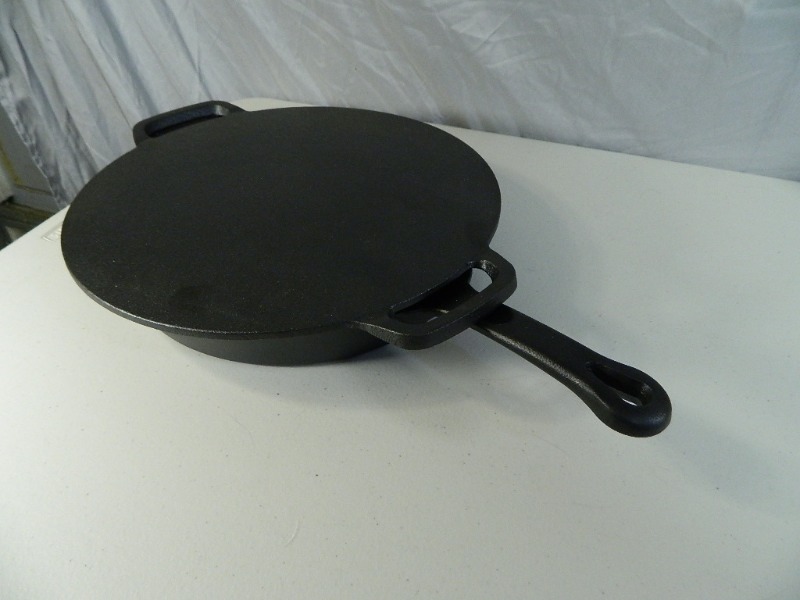 lot 44 image: New Cast Iron Skillet with Cast Lid