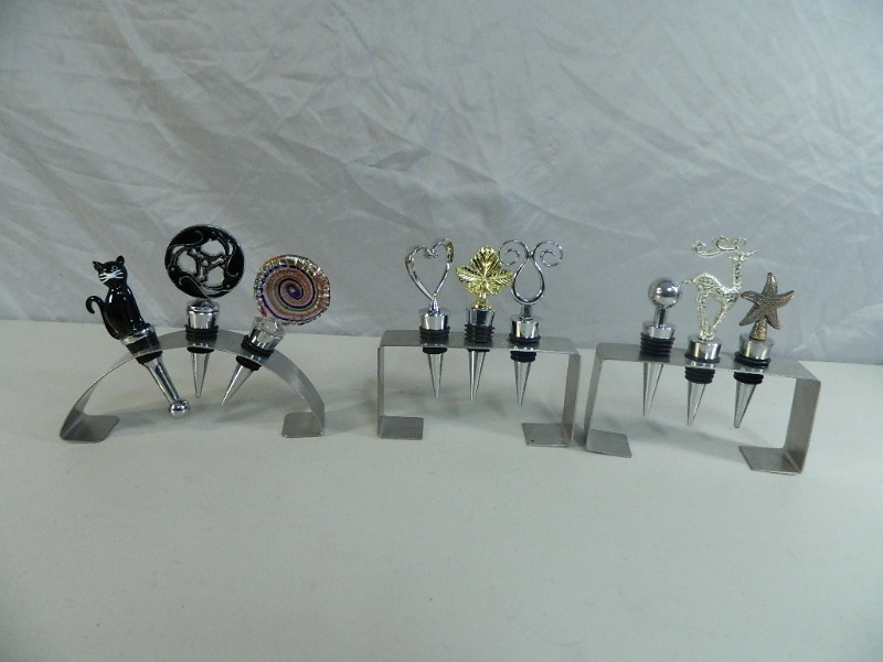 lot 76 image: 9 New Wine Stoppers with Stands
