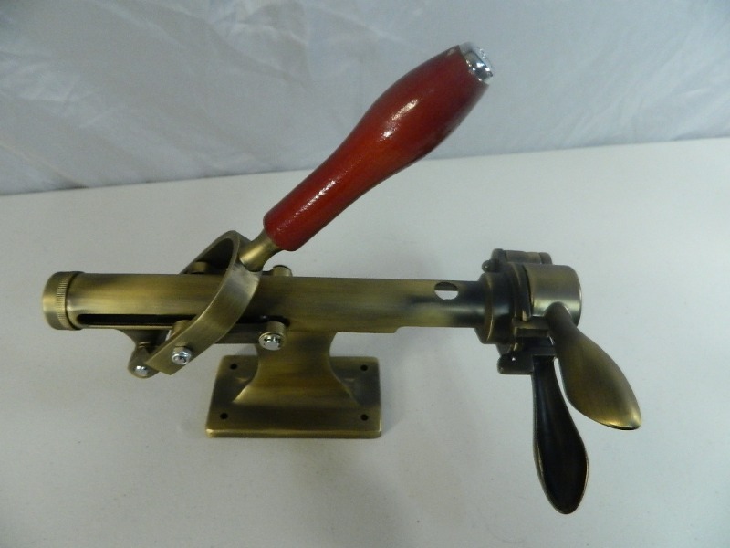 lot 79 image: Wall  Cabinet Mount Wine Opener