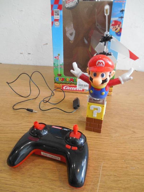 lot 67 image: Carrera Super Mario Flying Cape Mario 2.4GHz Radio Control Copter
