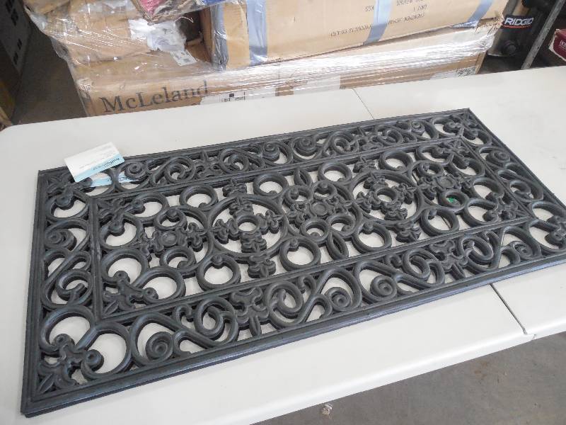 lot 98 image: (2) 19X41 RUBBER SCROLL DOOR MAT