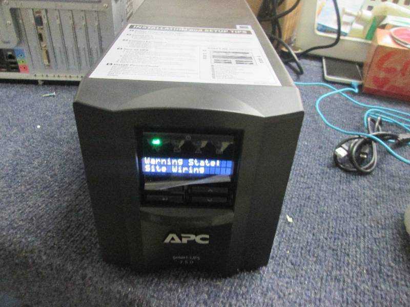 lot 18 image: smart ups 120v Model 750 powers up...
