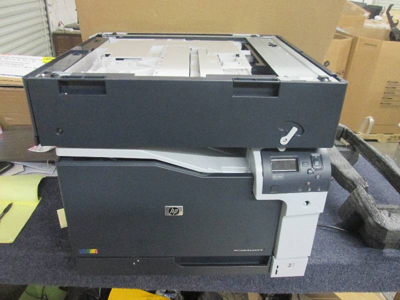 lot 30 image: HPM750 laserjet printer damaged ...