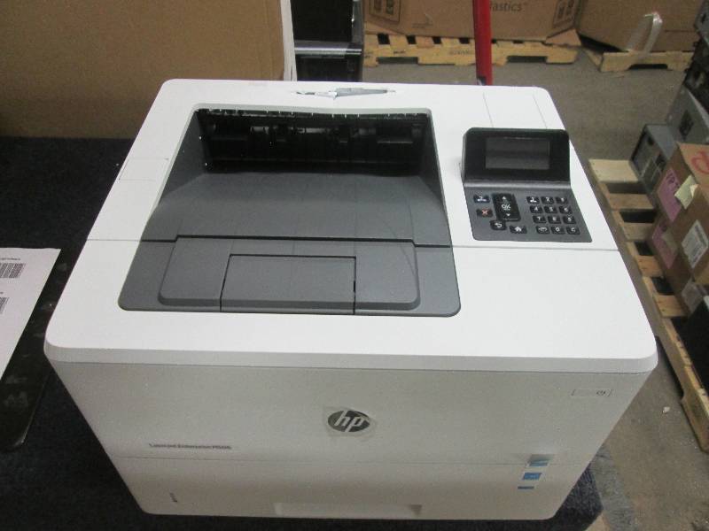 lot 34 image: hp M506 Printer power on...