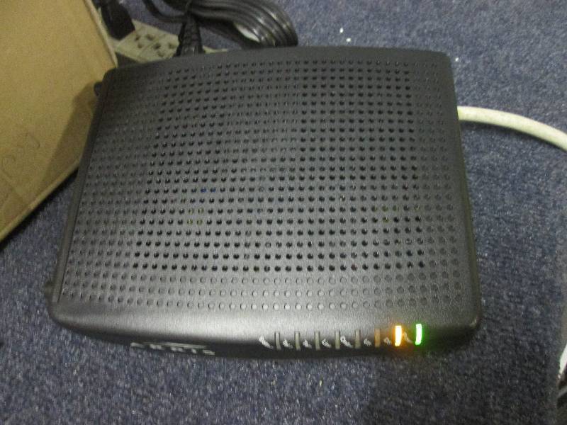 lot 36 image: Arris touchstone telephony modem...
