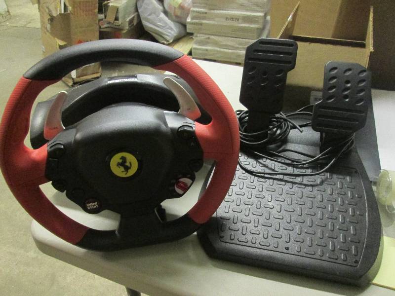 lot 90 image: thrustmaster ferrari wheel for xbox...