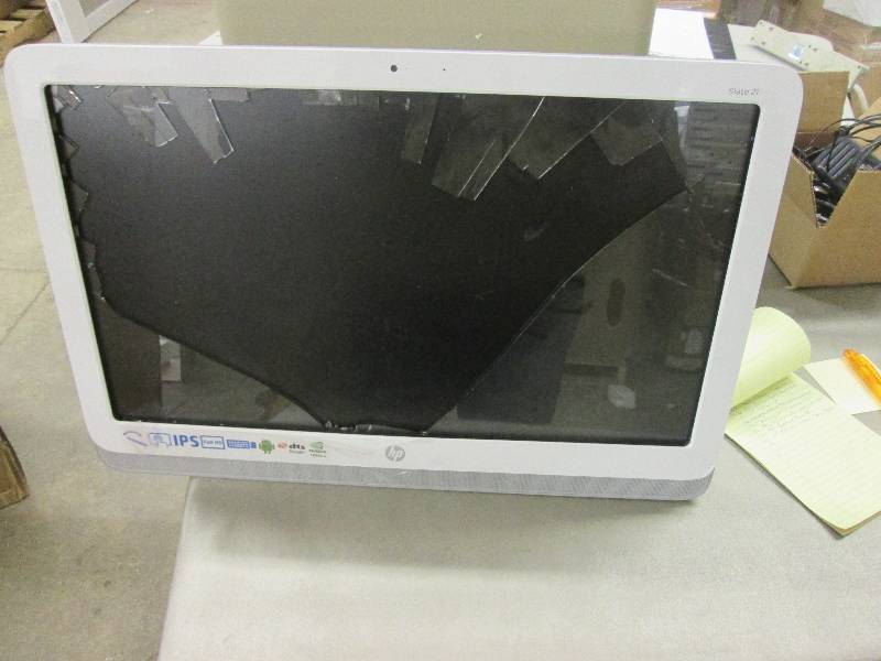lot 115 image: HP slate 21 pc. Brokn screen see pi...