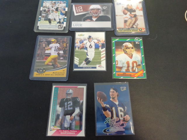 lot 78 image: Star NFL QuarterBack Rookie Cards w Andrew Luck, Blake Bortles, Jason Garrett