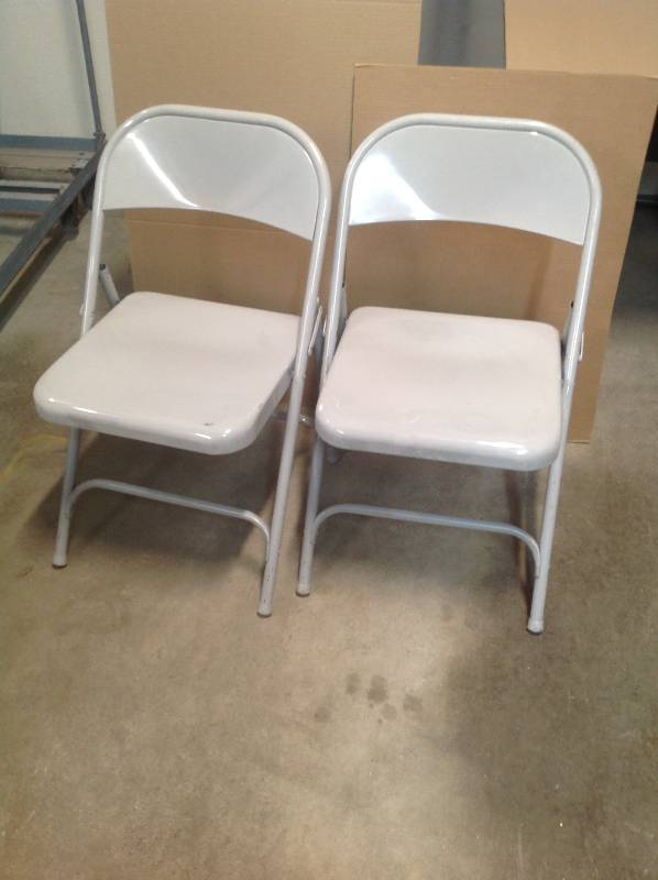 2 metal folding chairs