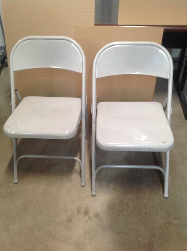 2 metal folding chairs