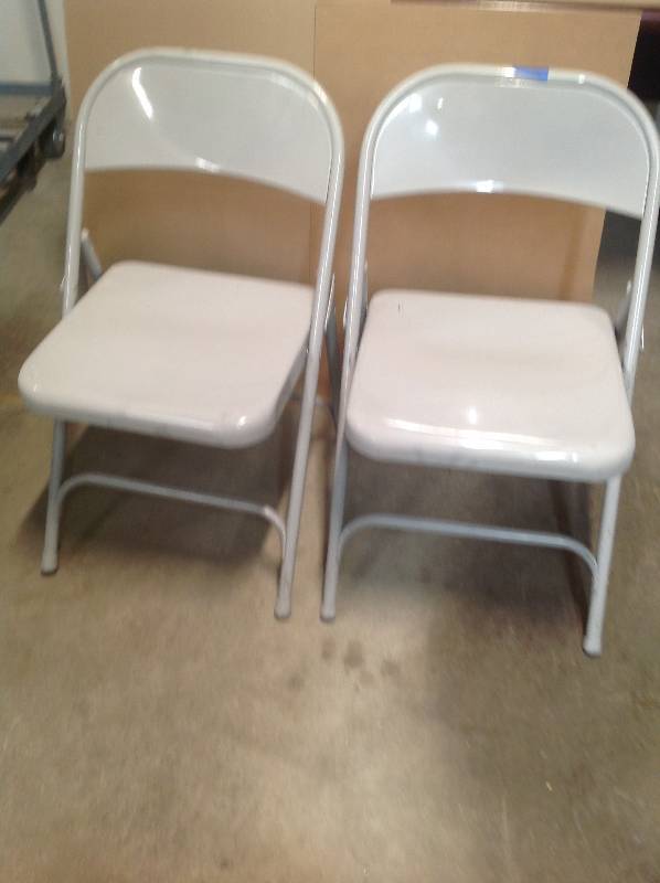 2 metal folding chairs