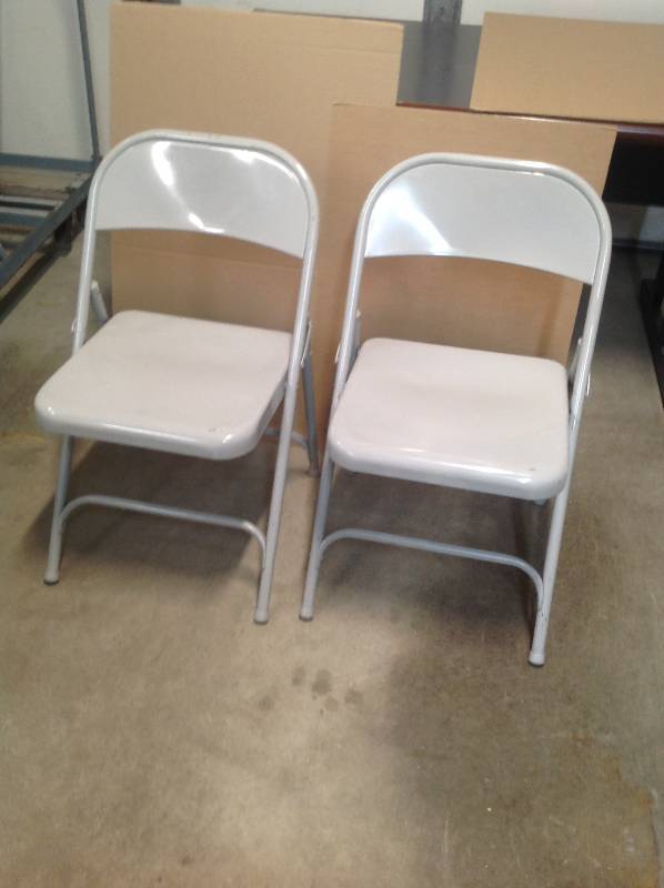 2 metal folding chairs