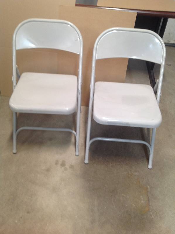 2 metal folding chairs
