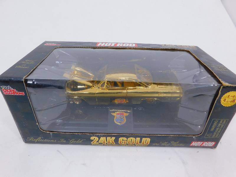 lot 97 image: Hot Rod Magazine 24K Gold Plated Die Cast.
