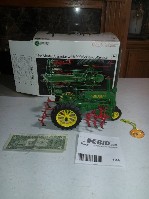 lot 134 image: Model A Tractor with 290 Series Cultivator