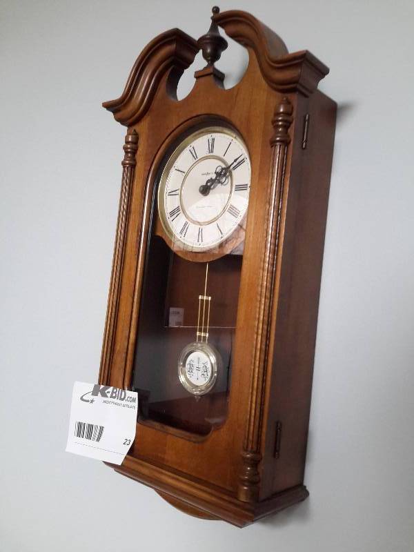lot 23 image: Howard Miller Wall Pedulum Clock