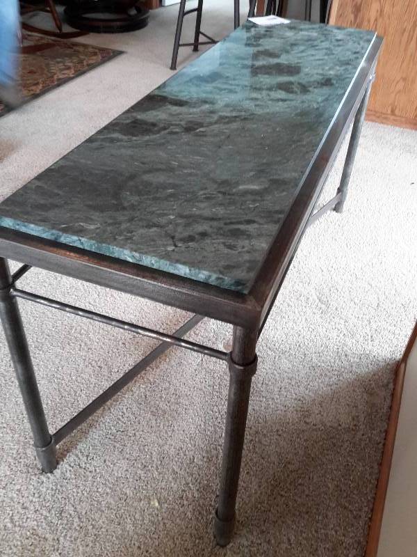 lot 12 image: BlueGreen Stone top sofa table.. Bronze metal finish to base