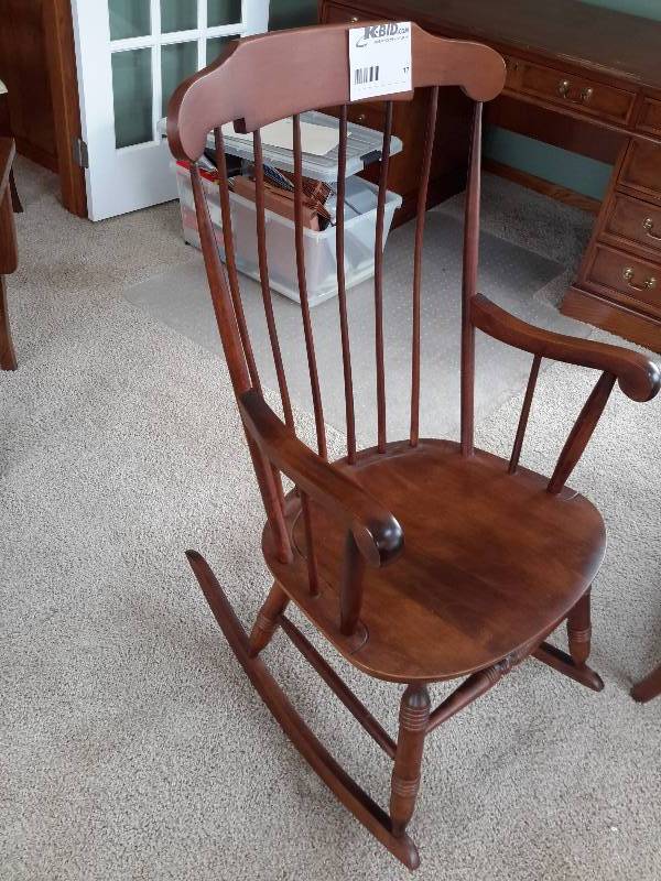 lot 17 image: Spindle Rocker Solid wood.. Looks like Walnut wood