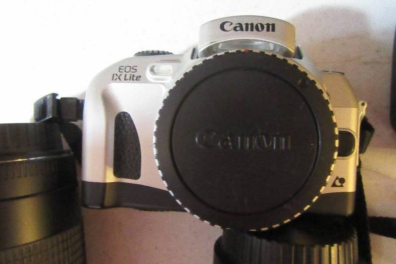 lot 246 image: CANON, EOS IX Lite camera system.. Zoom lenses as shown and flash