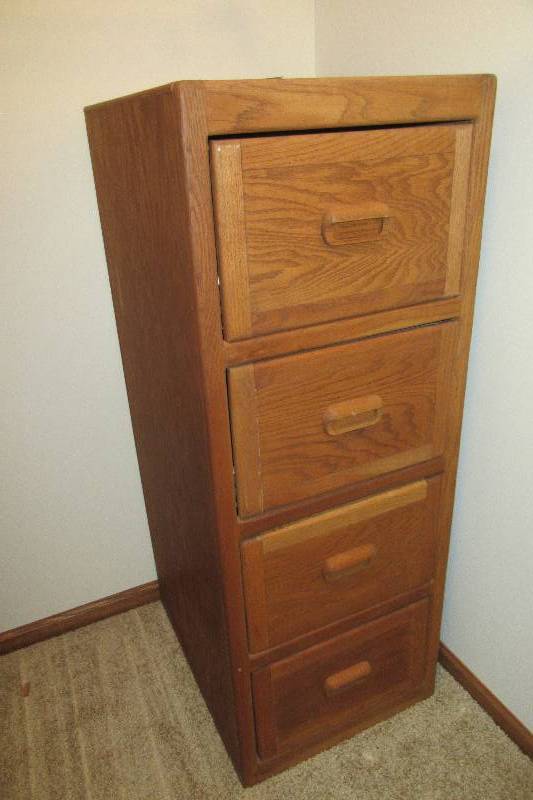 lot 30 image: Solid wood, Legal, 4 drawer file cabinet
