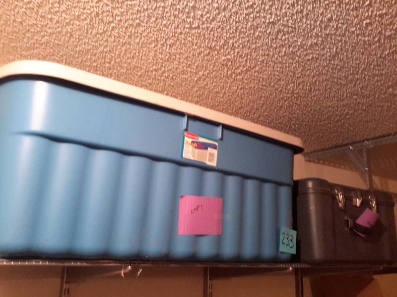 lot 233 image: 2 large storage tubs.. 1 has clamp closers..