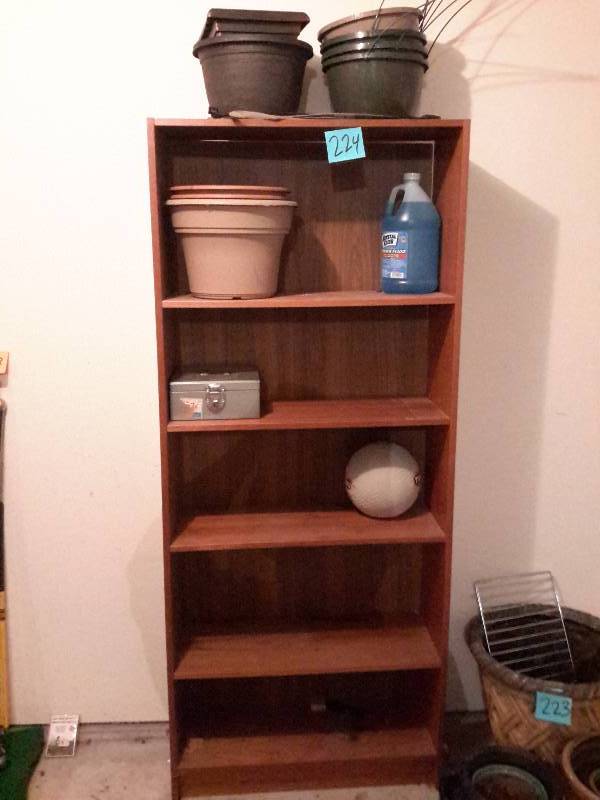lot 224 image: 30 in x 12 in x 6ft book shelf and everything on it.  Some damage to the front edge of one shelf